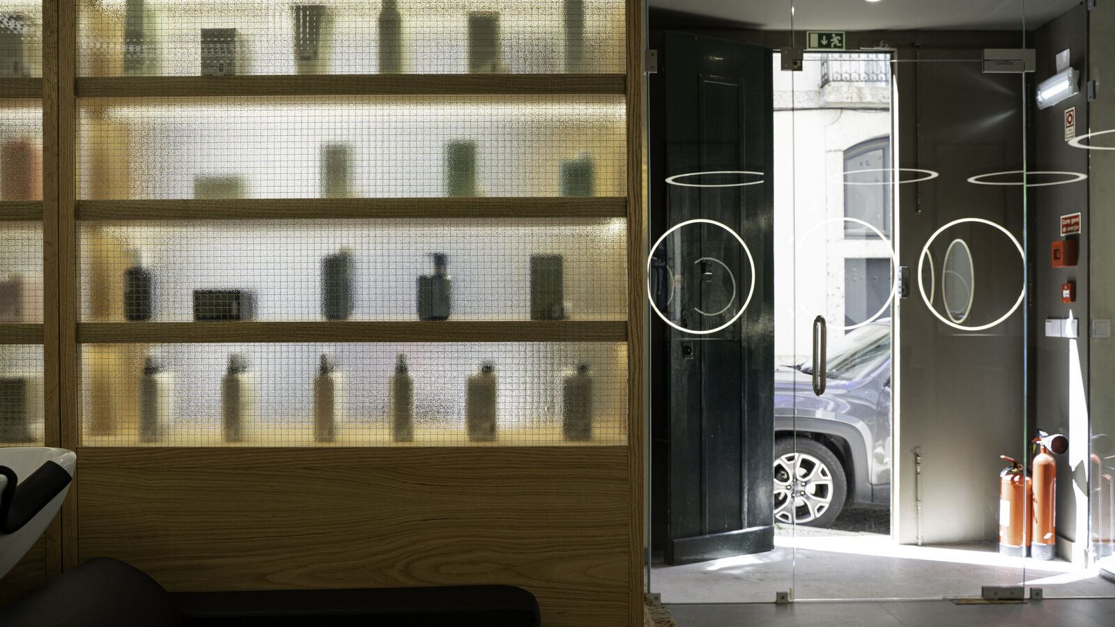 Lit shelving by the entrance, Cut & Shout